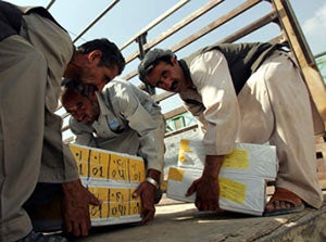 Afghan workers loading ballot papers onto a truck in Kabul September 16, 2005. (c) Reuters/Ahmad Massod 2005