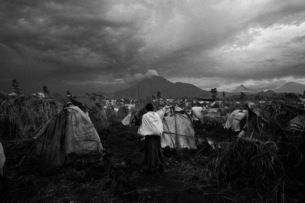 Forced to flee their homes in Karuba and Mushake because of fighting between government forces and Nkunda's troops, these displaced people seek shelter in a camp in Goma. � 2007 Marcus Bleasdale