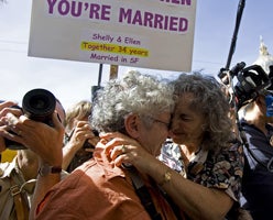 Shelly Bailes and her partner Ellen Pontac hug after hearing a decision by California's Supreme Court in San Francisco. � 2008 Reuters
