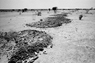 Mass graves encircle the village of Jijira Adi Abbe in Darfur, western Sudan after the government attack.