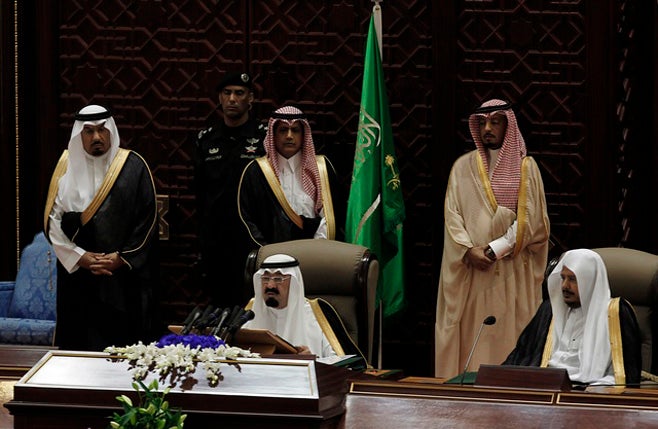 King Abdullah of Saudi Arabia (center, seated) addressed the advisory Majils Al-Shura Sunday, announcing that women would have the right to vote in 2015s municipal elections. (Photo courtesy of Reuters)