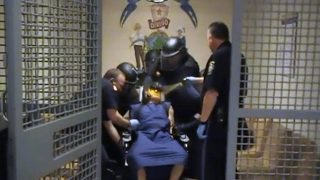 <p>Image of  Paul Schlosser III, who is diagnosed with bipolar disorder and depression, being pepper sprayed on June 10, 2012 by a correctional officer at the Maine Correctional Center in Windham, Maine. The image is a screengrab of a video of the incident which was taken by officers at the prison, and which is posted on YouTube at <a href=