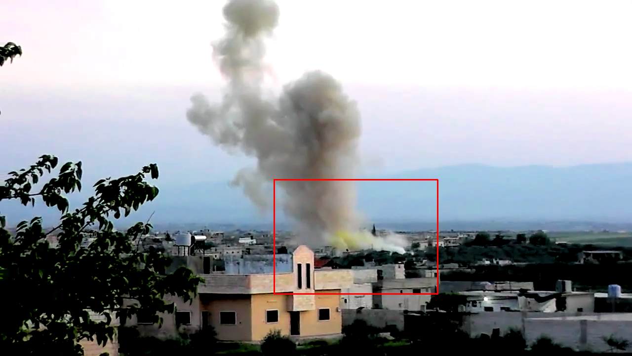 <p>Screenshot from a video posted to YouTube on April 11, 2014 shows substantial yellow coloration at base of the cloud over Keferzita, Syria, drifting with main cloud, and color intensity appears to quickly dissipate over next 20 seconds.</p>