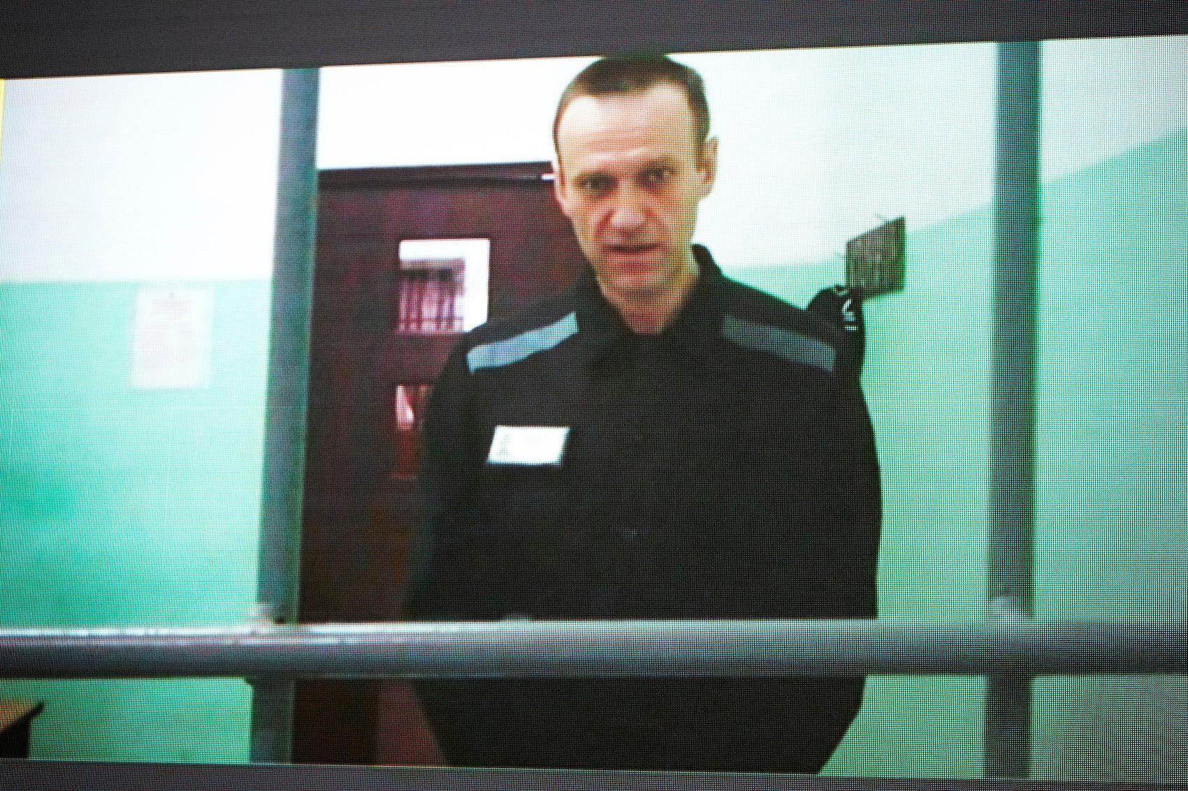  Russian opposition leader Alexei Navalny is seen on a TV screen as he appears in a video link provided by the Russian Federal Penitentiary Service from the colony in Melekhovo, Vladimir region, during a hearing at the Russian Supreme Court in Moscow, Russia,  June 22, 2023.