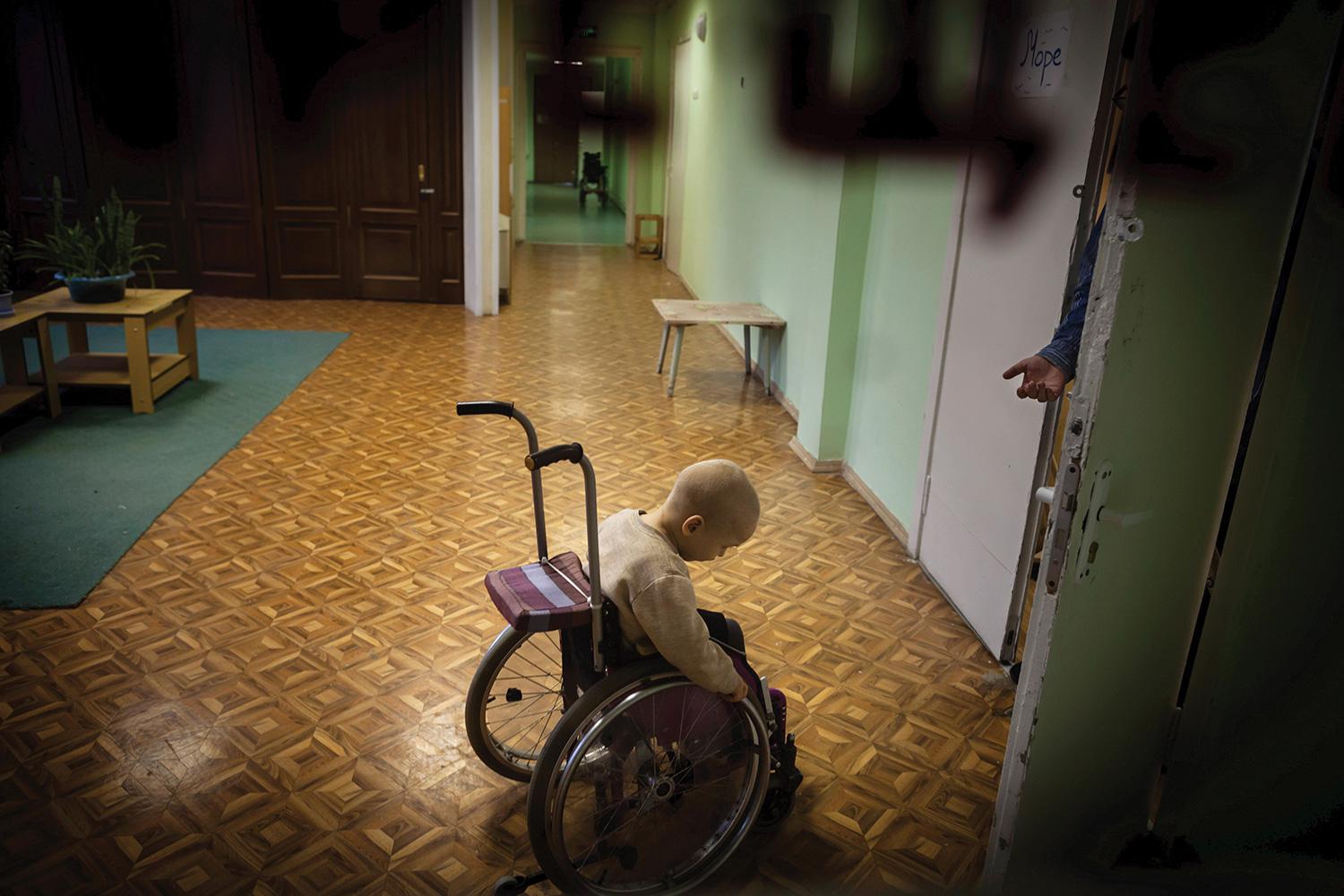 A child in a Russian state orphanage for children with disabilities.