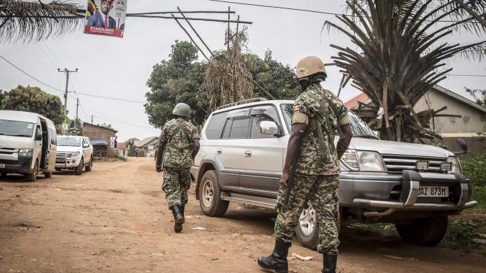 Ugandan soldiers patrol in Magere, Uganda, January 14, 2021. 