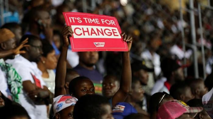Supporters of George Weah attend a meeting during their party's presidential campaign rally at Samuel Kanyon Doe Sports Complex in Monrovia, Liberia December 23, 201