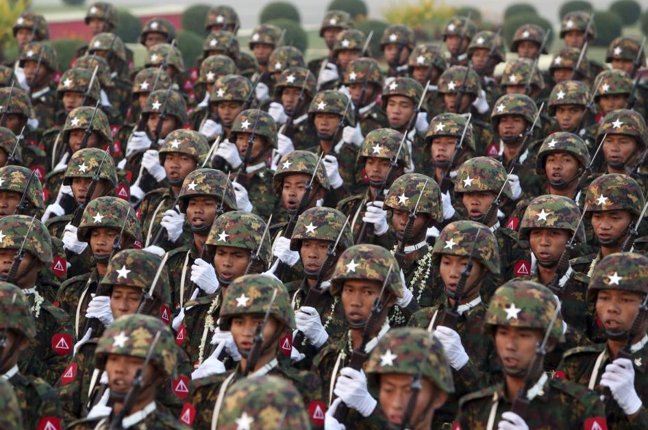 Myanmar soldiers march during a parade to mark the 74th Armed Forces Day in Naypyitaw, Myanmar.