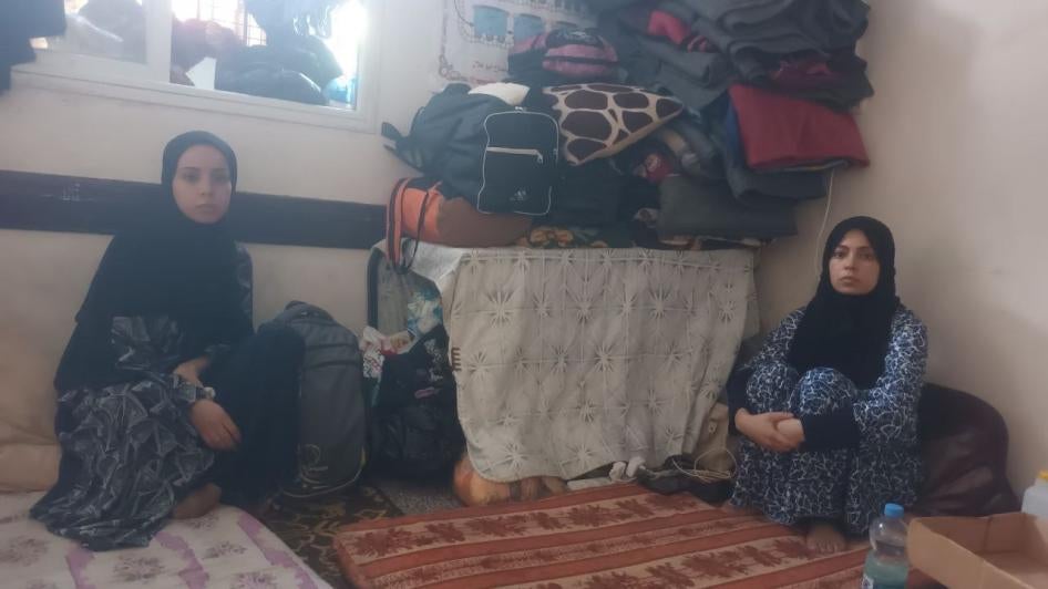 Iman (left), 19, and her sister Abir, who live in Gaza, have hearing disabilities and use sign language to communicate. Iman said, “I don’t have a hearing device, so I don’t know when they are bombing! I can feel the vibration under my feet, and I see people running without knowing what is happening!”