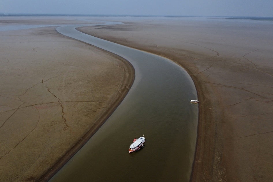A boat travels through a section of the Amazon River affected by drought in Amazonas state, near Manacapuru, Brazil, September 27, 2023. 