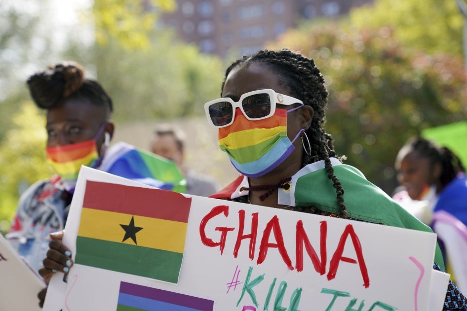 A demonstrator attends a rally against a controversial bill being proposed in Ghana's parliament that would make identifying as LGBTQIA or an ally a criminal offense punishable by up to 10 years in prison, Harlem, New York, October 11, 2021. 