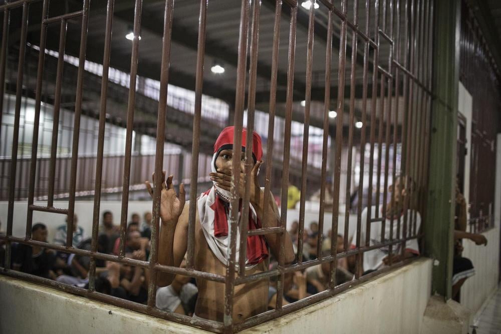 Men with psychosocial disabilities are locked up in a crowded room in the male section of Galuh Rehabilitation Center in Bekasi.
