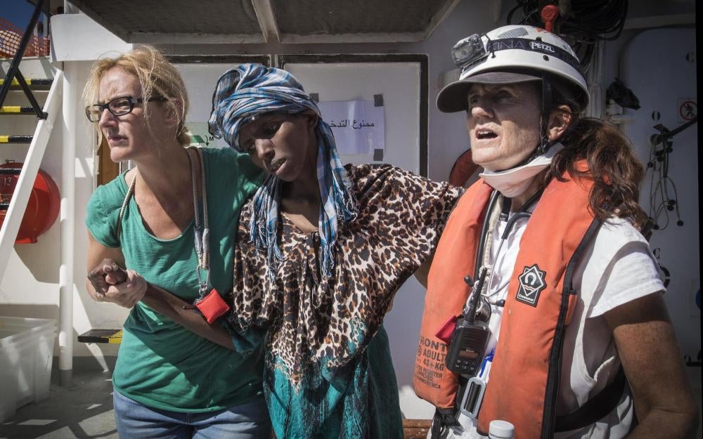 A severely emaciated Somali woman is helped into the ship’s clinic. October 11, 2017.