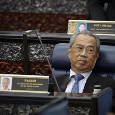 Prime Minister Muhyiddin Yassin attending parliament session at parliament lower house in Kuala Lumpur, Malaysia, Monday, July 13, 2020.