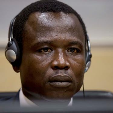 Dominic Ongwen, a Ugandan commander in the Lord’s Resistance Army, waits for the judge to arrive as he made his first appearance at the International Criminal Court in The Hague, Netherlands, Monday, Jan. 26, 2015.