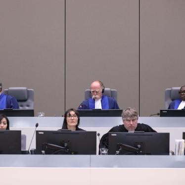 Marc Perrin de Brichambaut, Péter Kovács, and Reine Alapini-Gansou are the three pre-trial chamber judges assigned to the Palestine situation at the International Criminal Court (ICC). The photo shows them in an ICC hearing related to Mali on July 8, 2019.