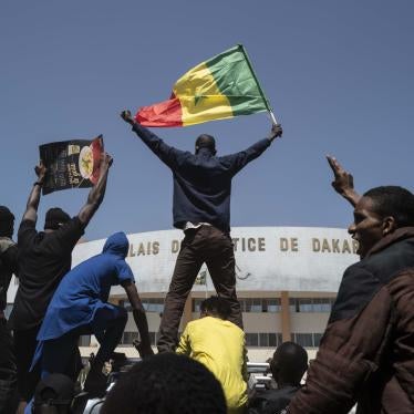 Demonstrators shout slogans during a protest against the arrest of opposition leader and former presidential candidate Ousmane Sonko near the Justice Palace of Dakar, Senegal, March 8, 2021. 