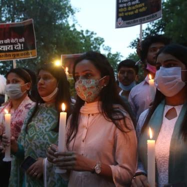 Activists hold a candlelight march protesting the alleged rape and murder of a 9-year-old Dalit girl in New Delhi, India on August 4, 2021. 