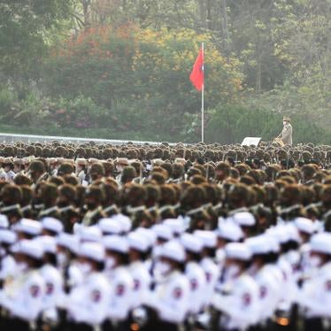 Officers march during a parade to commemorate Myanmar's 77th Armed Forces Day