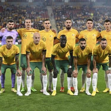 The Australian national soccer team, the Socceroos, pose for a photo before the start of a game in Brisbane, Australia.