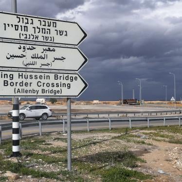  A road sign points to the Allenby/King Hussein Bridge crossing to Jordan, in the city of Jericho in the Israeli occupied West Bank.