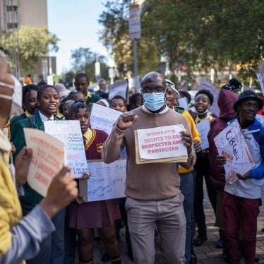Protestors demonstrate in front of the South African Human Rights Commission (SAHRC) against xenophobia and vigilantism in the country, Johannesburg, during Africa Day, May 25, 2022.