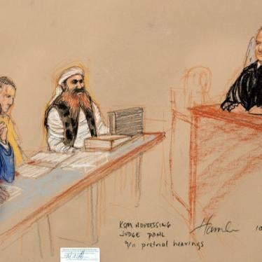 Khalid Sheikh Mohammed, (2nd R) the alleged mastermind of the September 11 attacks, addresses the judge during the third day of pre-trial hearings in the 9/11 war crimes prosecution as depicted in this Pentagon-approved courtroom sketch at the U.S. Naval 