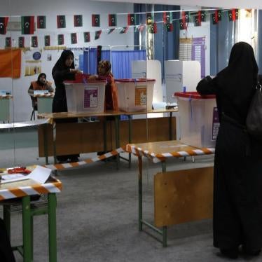 A woman votes at a polling station inside a school in Tripoli, Libya, June 25, 2014. © 2014 Reuters