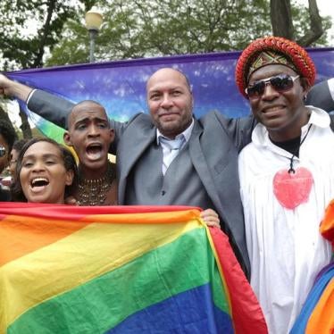 Jason Jones, activist of the LGBT community celebrates with other activist court judgment outside the Hall of Justice in Port-of-Spain, Trinidad and Tobago, April 12, 2018.
