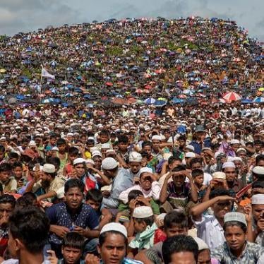Rohingya refugees gather in the open field at kutupalong refugee camp to commemorate the second anniversary of the 2017 crisis when they were forced to flee from their northern Rakhine state homes in Myanmar escaping a brutal military crackdown. According