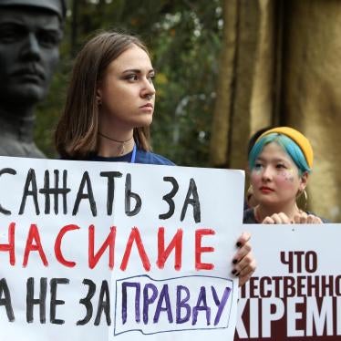 Participants protest against discrimination and gender-based violence during a rally held by members of feminist organizations and social activists in Almaty, Kazakhstan.