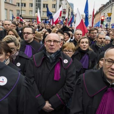 Polish judges, joined by judges from other European countries, wear their robes during a January 11 protest against proposed reforms that would undermine judicial independence. 
