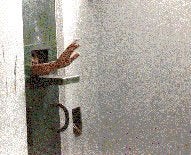 Inmate signaling through feed slot