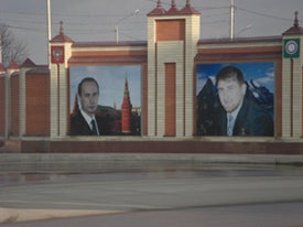 Portraits of President Vladimir Putin and President Ramzan Kadyrov alongside a road in Grozny. � 2008 Tanya Lokshina / HRW