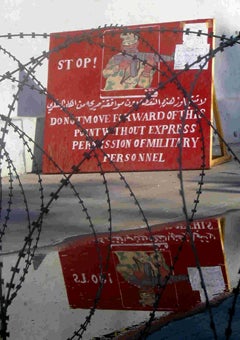 A U.S. military sign at a checkpoint outside a Baghdad hotel.
