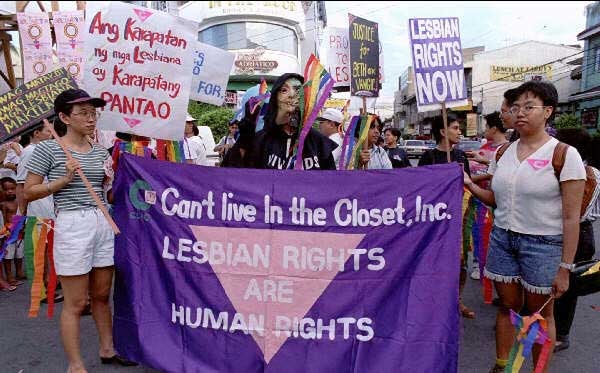 1.Lesbians gather in the first LGBT Pride March in Manila, the Philippines, June 22 © 1996 Reuters Limited.


