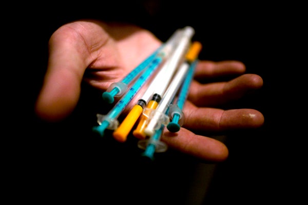 Used needles are returned to a needle exchange point in St. Petersburg, Russia. &copy; 2007 Lorena Ros

