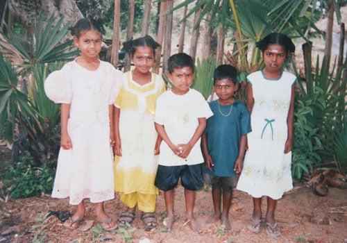 Three of these five children died on November 8, 2006 when government forces shelled school grounds in Kathirivelli in Batticaloa district that was housing thousands of displaced civilians, killing 62 and wounding 47.  The victims are Gunanathan Suveeka, age 8 (first from left), Gunanathan Rajkumar, 6 (third from left) and Gunanathan Sarojinidari, 8 (fifth from left).  © 2006 private