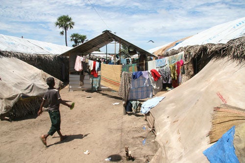 A Tamil boy in a displaced persons camp outside Batticaloa town in February 2007.  One month later the authorities forced more than 900 displaced persons nearby to return to their homes in still insecure areas.&copy; 2007 Fred Abrahams/Human Rights Watch