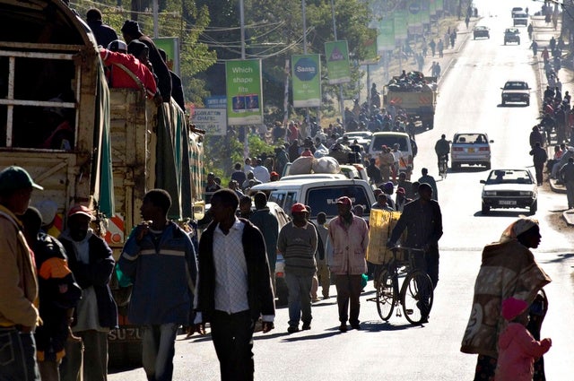 On the next two days, tens of thousands of people started leaving their homes.  In particular Kikuyu people began moving out of the slums of Nairobi, the Rift Valley and western Kenya in general, where they were targeted by gangs of ethnic Luo and Kalenjin in Eldoret, Nakuru, Molo and Kisumu. These people are seeking sanctuary in Eldoret in the Rift Valley. Others sheltered in police stations, churches and hastily set-up camps run by the Kenyan Red Cross. &copy; 2008 Reuters
