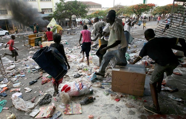 Residents capitalized on the breakdown of law and order by helping themselves to whatever they could find, including the crops of their neighbors.  Here, residents emptied shops in downtown Mombasa. &copy; 2007 Reuters
