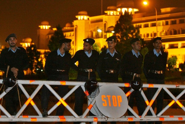 Policemen block the road leading towards the Supreme Court in 

Islamabad on November 4, 2007. 
© 2007 Reuters

