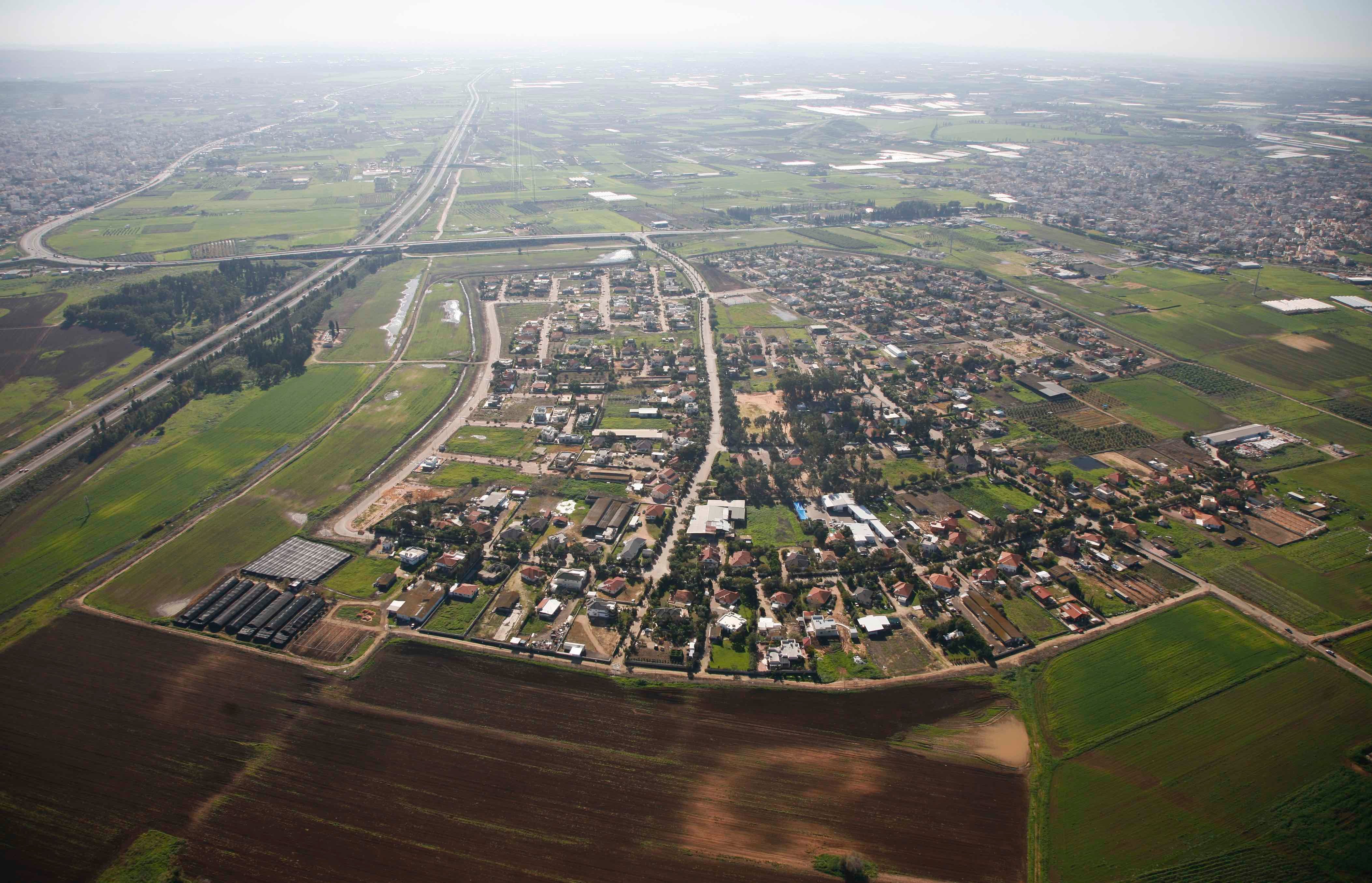 Sha’ar Efraim, an all-Jewish community in central Israel, just east of the Palestinian town of Qalansawa. Aerial photography taken between 2011 and 2015.