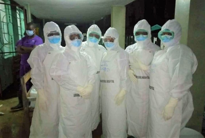 Healthcare workers treating Covid-19 patients in Tanzania wear personal protective equipment used to protect against the transmission of the disease. The spread of Covid-19 has revealed the harmful impacts of insufficient healthcare investment by African governments, including inadequate supplies of personal protective equipment for healthcare workers. 