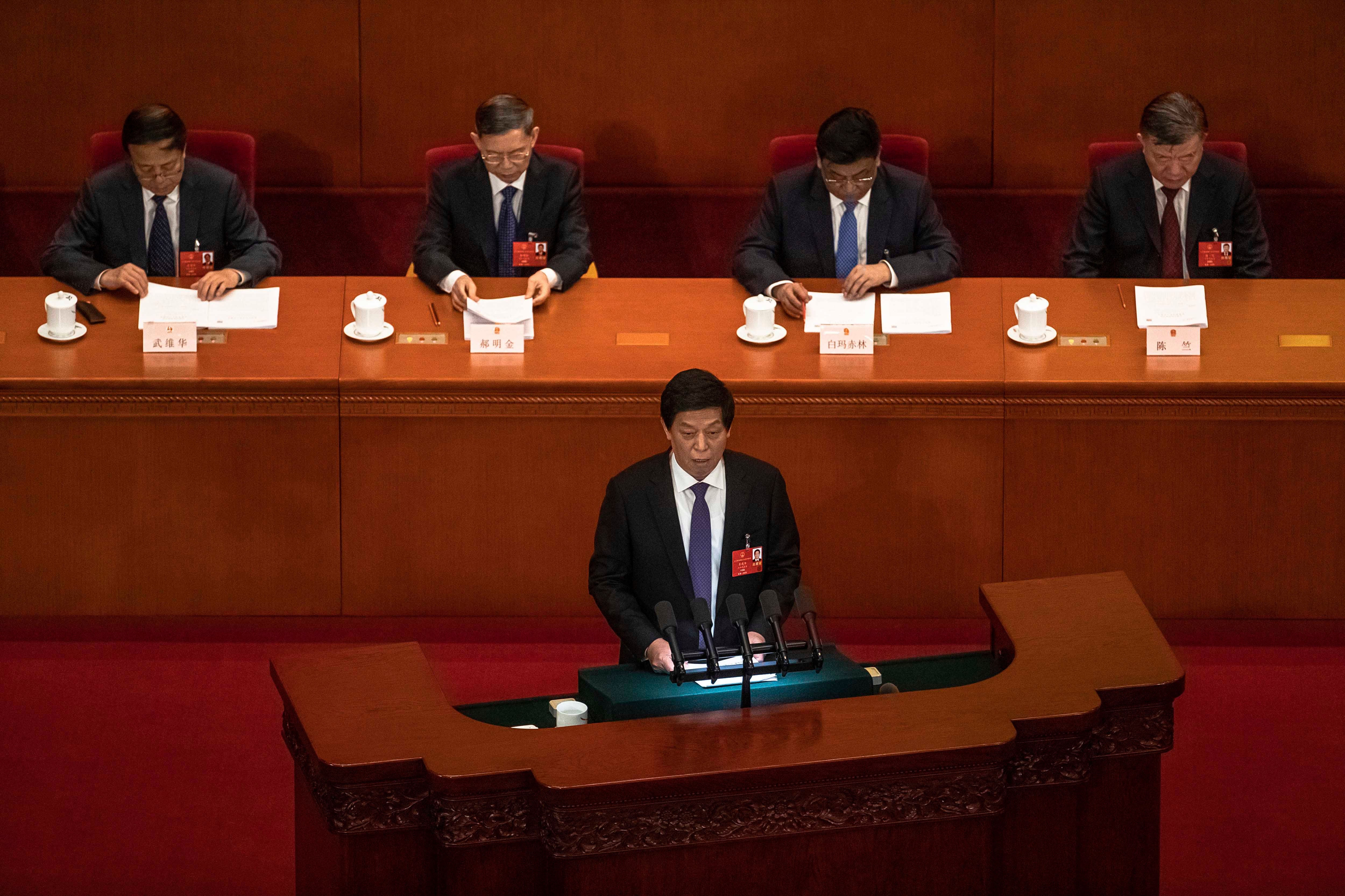 Li Zhanshu, National People's Congress Chairman delivers a speech during the second plenary session of China's National People's Congress (NPC) at the Great Hall of the People in Beijing, May 25, 2020. 