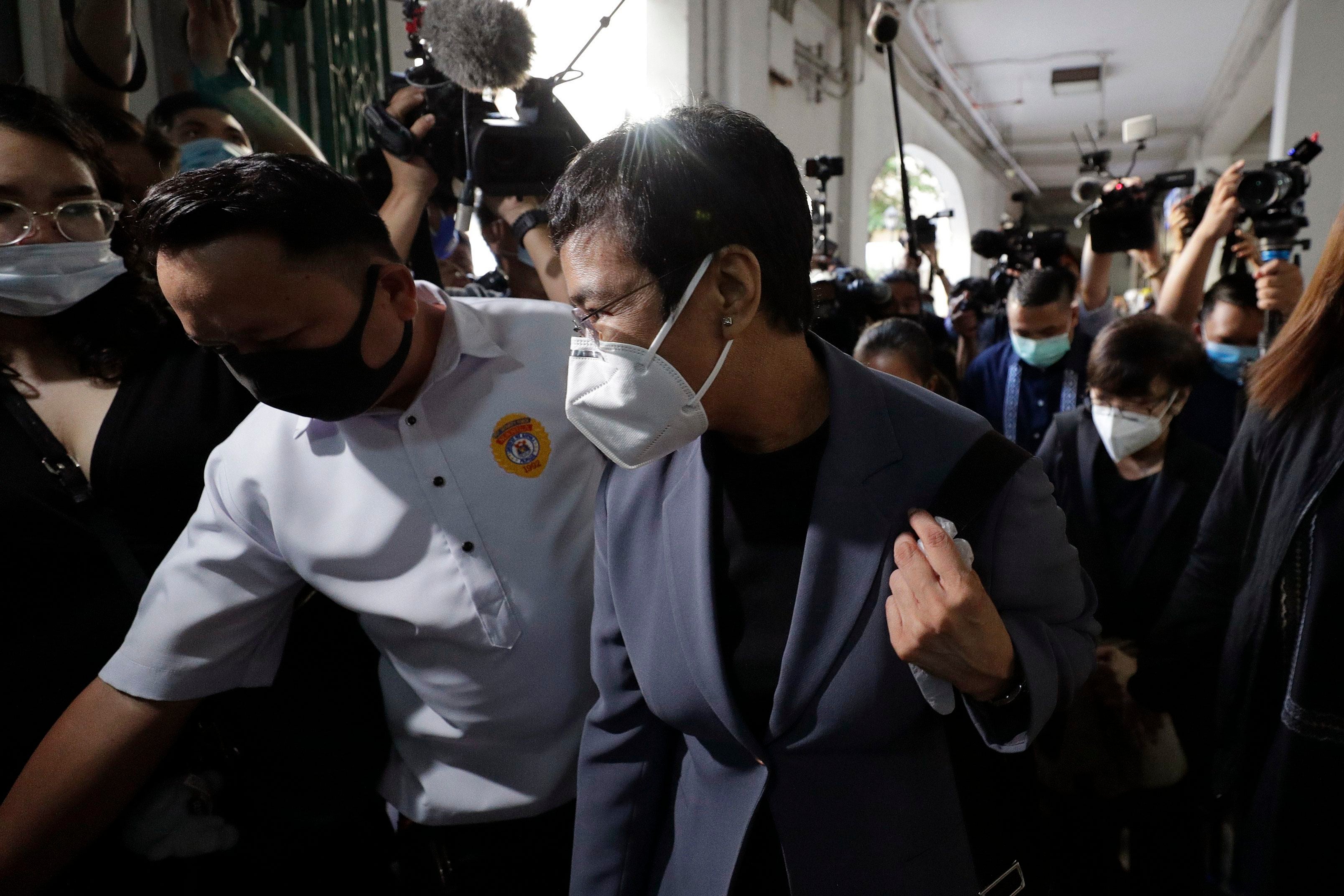 Maria Ressa arrives at court in Manila, June 15, 2020.