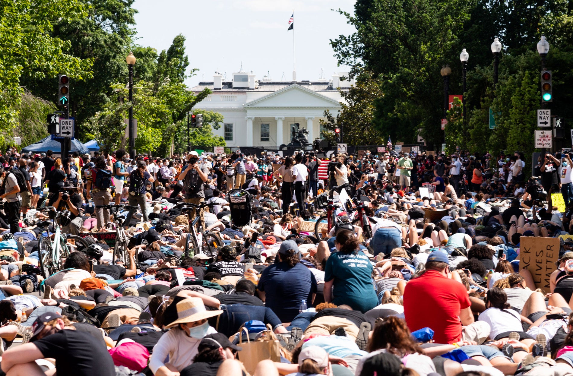 Demonstrators protest near the White House in Washington, DC, June 7, 2020, over the death of George Floyd, died after being restrained by Minneapolis police officers on May 25.
