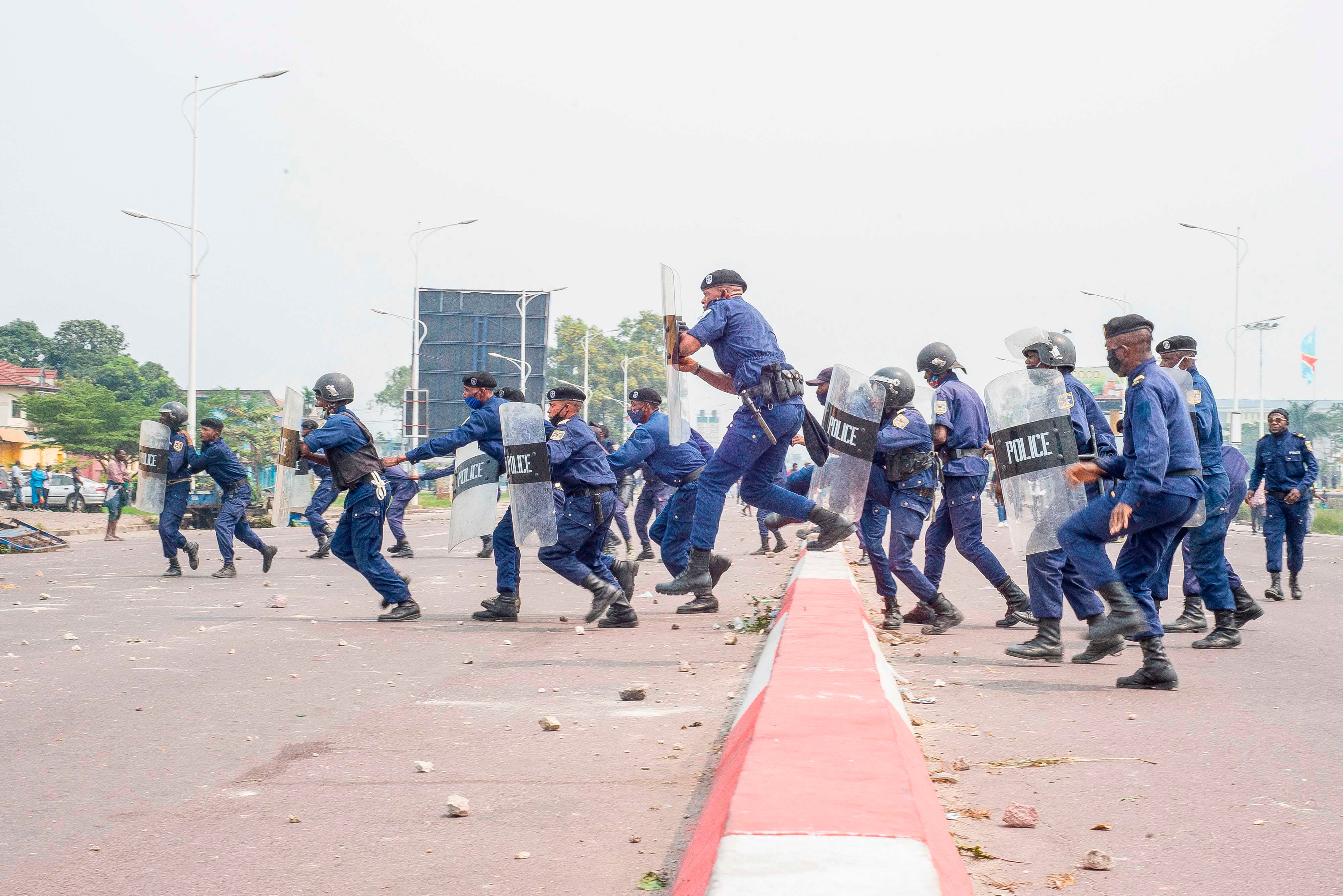 Police officers clash with demonstrators in Kinshasa on July 9, 2020 in demonstrations over the appointment of the new president of the Electoral Commission.