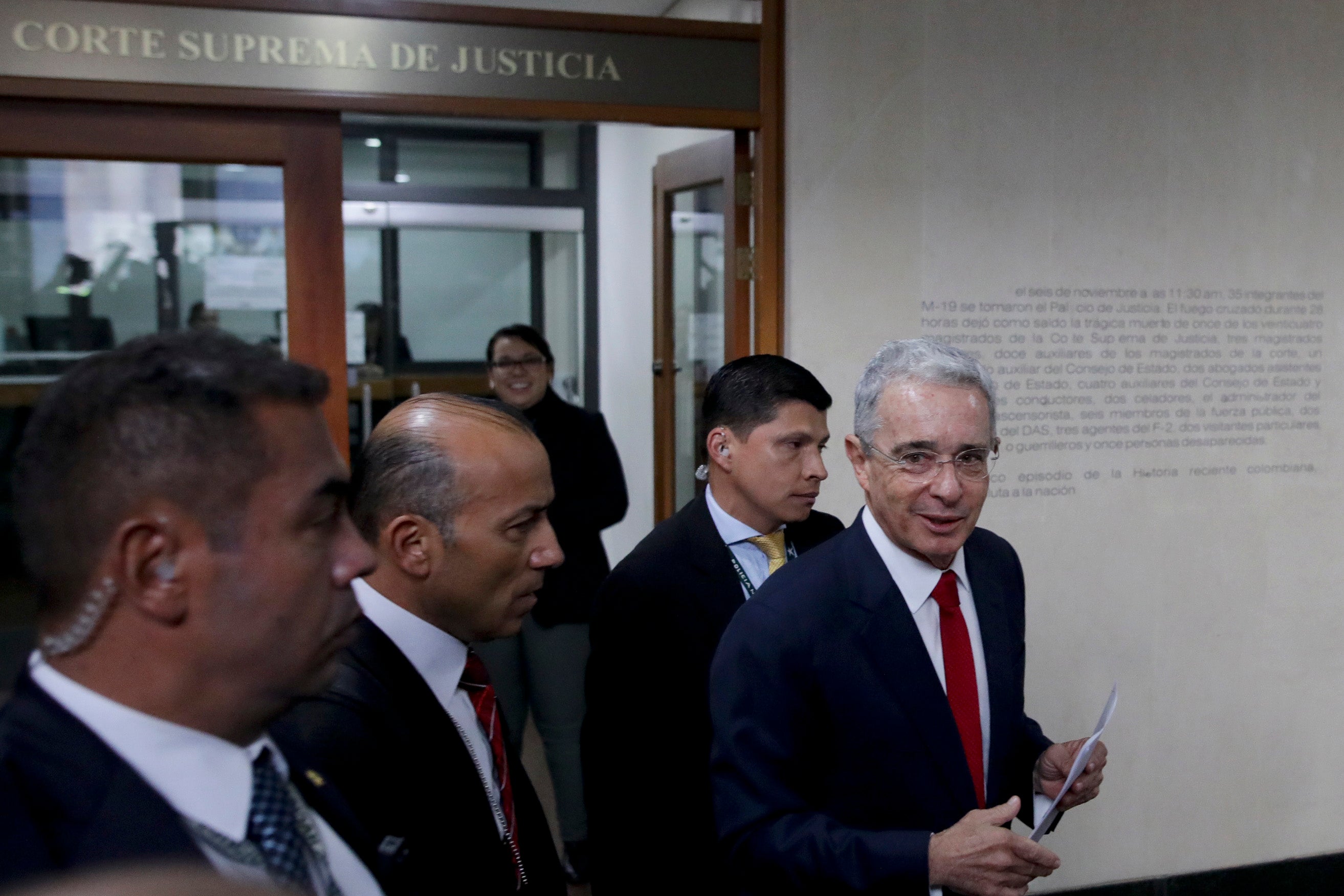 Former Colombian president Álvaro Uribe arrives at the Supreme Court for questioning in a case about his alleged involvement in witness tampering in Bogotá, Colombia, Tuesday, October 8, 2019.