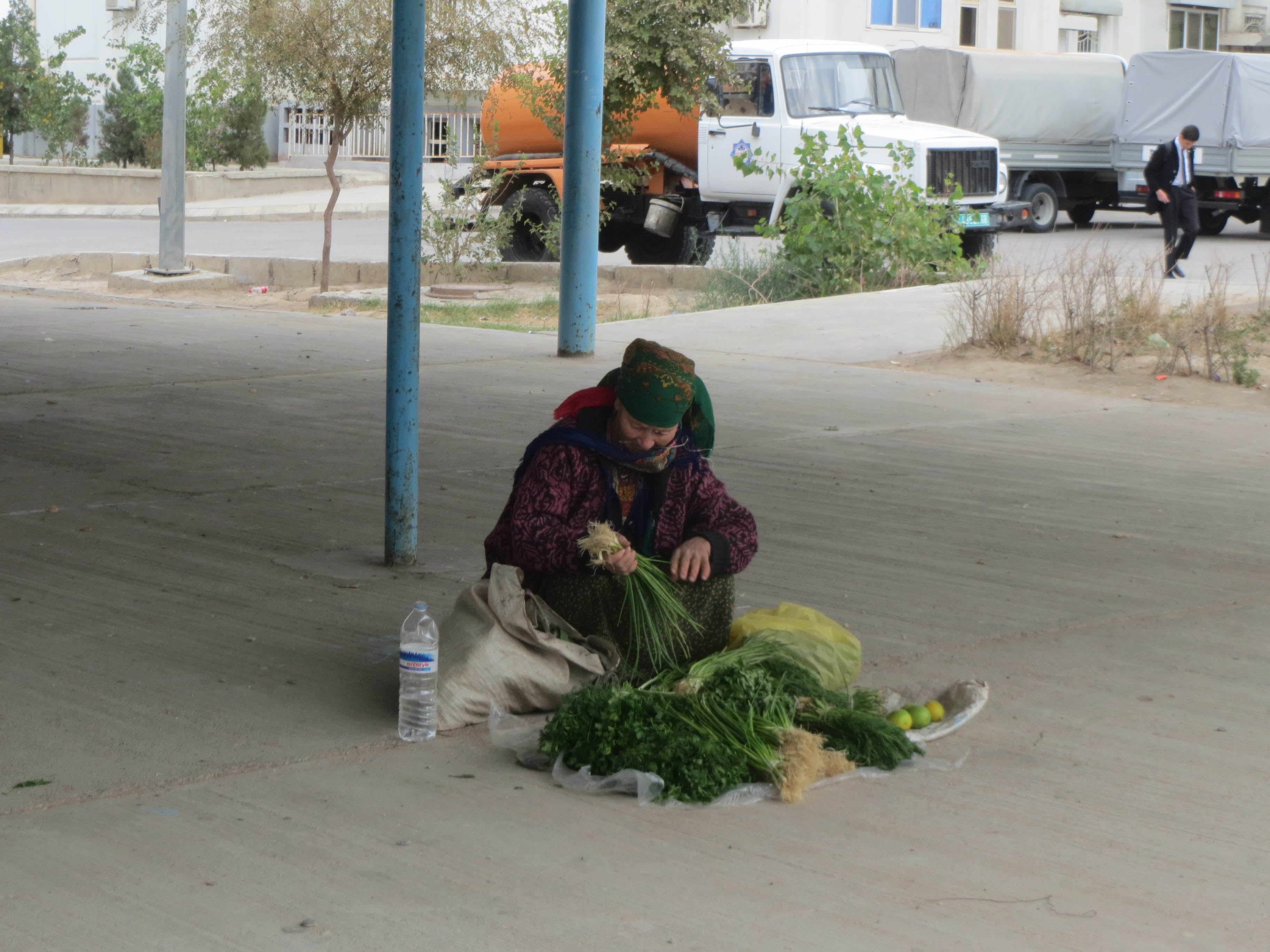 A woman sells herbs in Ashgabat.